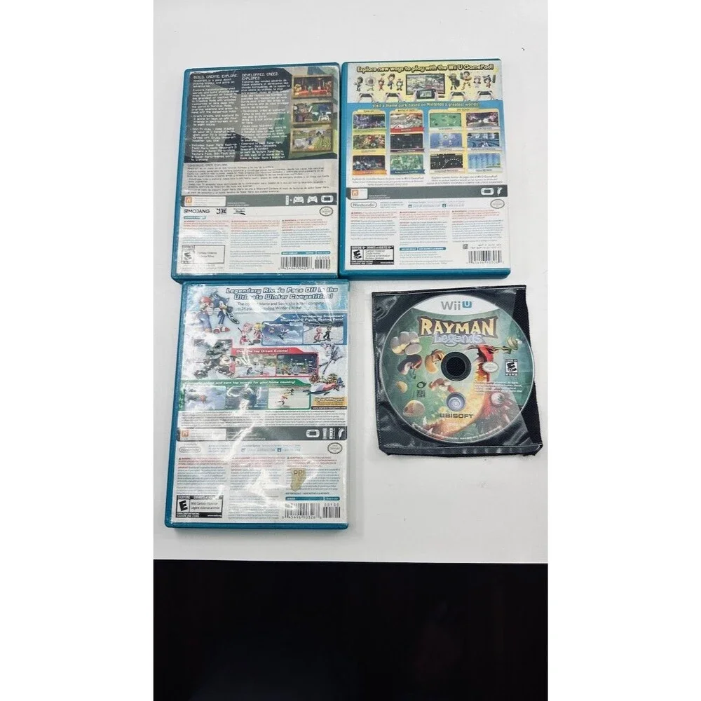 Wii U Game Lot of 4 - Nintendo Land, Minecraft, Rayman Legends, Mario & Sonic Ol